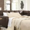 Signature Design By Ashley Navi Chestnut Faux Leather Sleeper Sectional With Right-Facing Chaise
